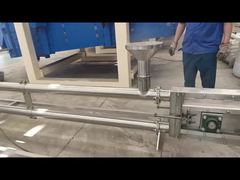 Vollständig geschlossener Rohrkettenförderer realisiert staubfreien Pulvertransport in Industriequalität